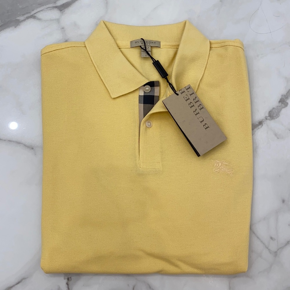 Burberry polo brand new with tags buttercup size large